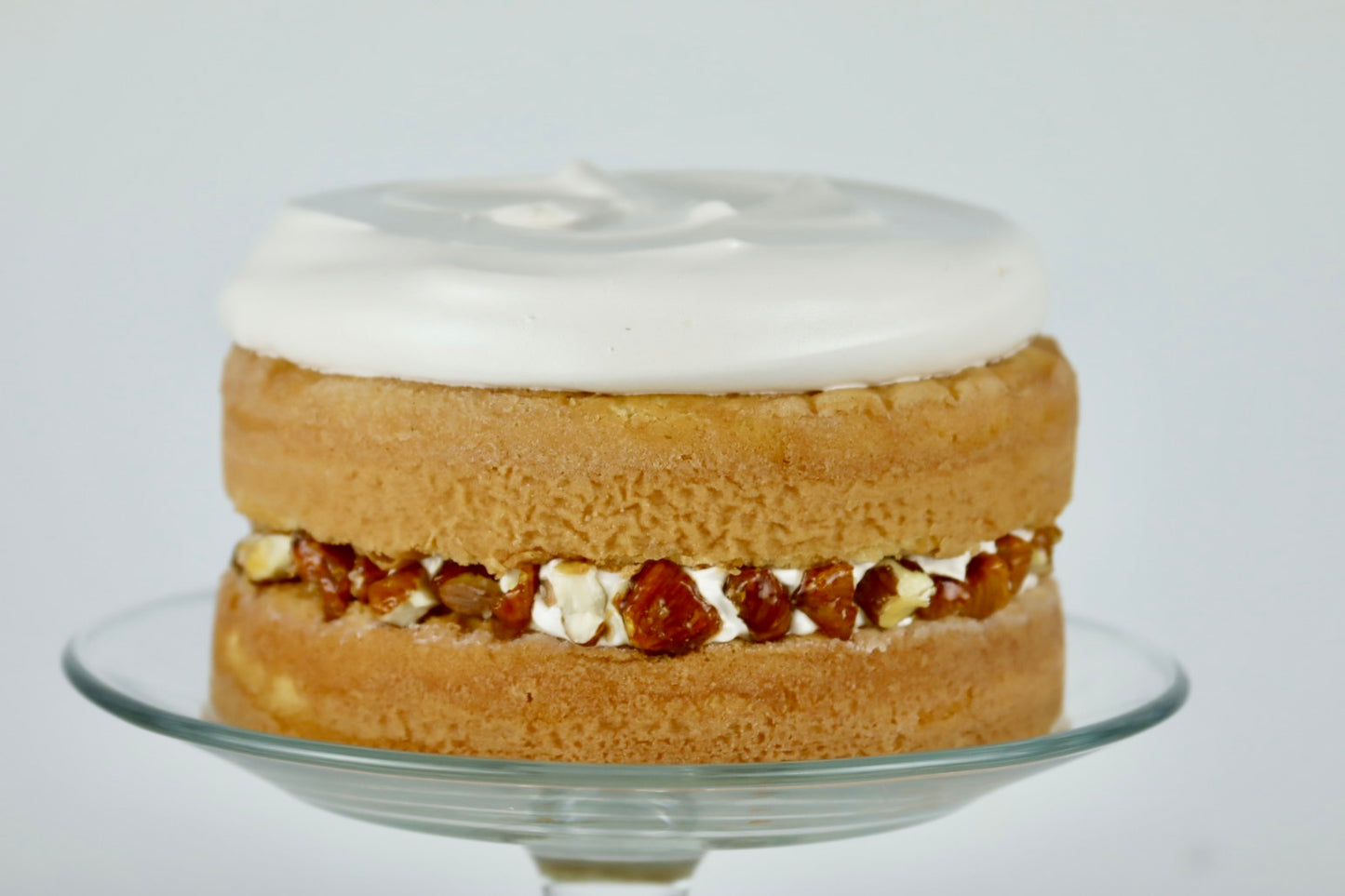 Pastel de Vainilla relleno de Almendra Caramelizada